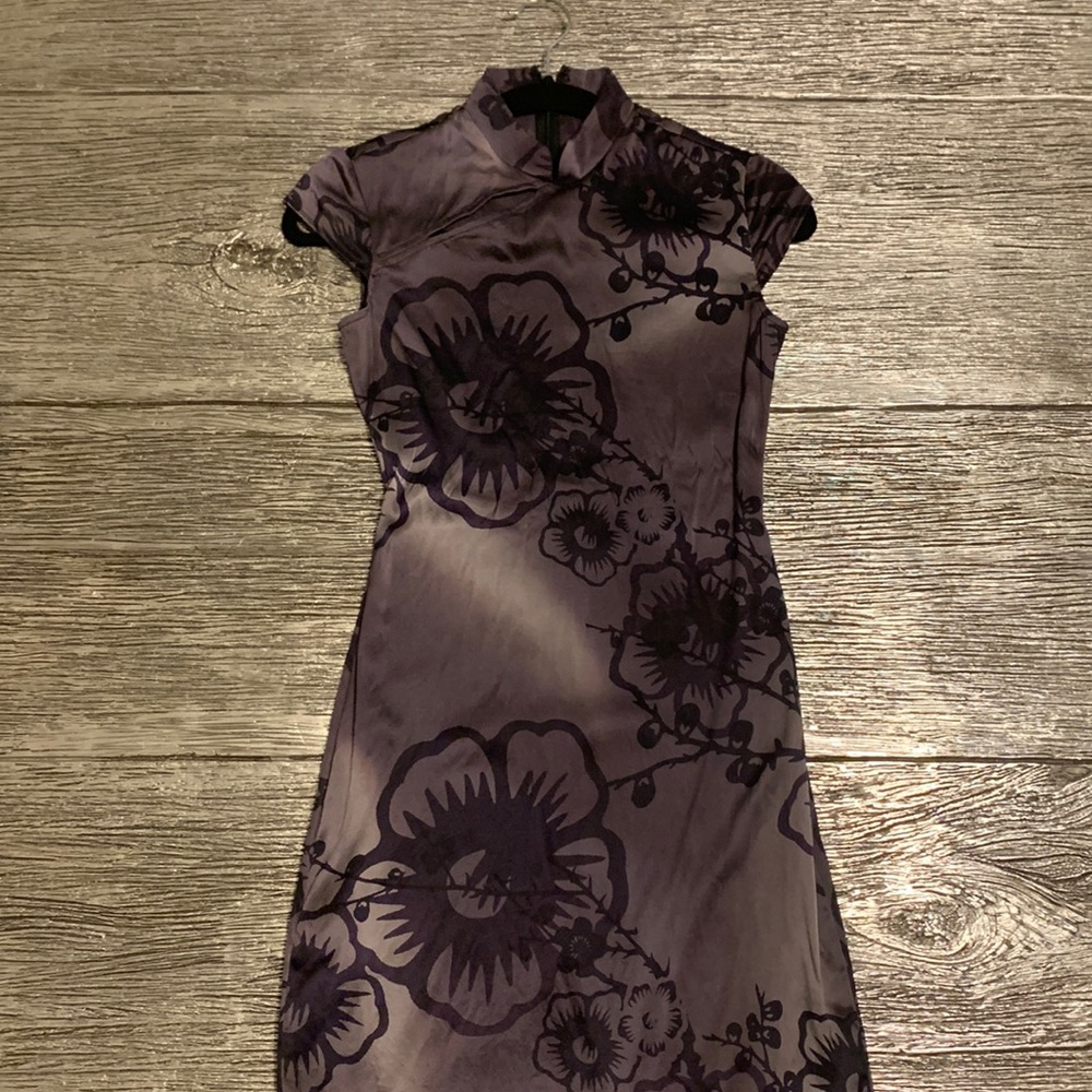 Dress . Brand Guess Size 4 purple and black .